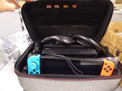 Lot 2243 - Case and bag containing Nintendo Switch and...