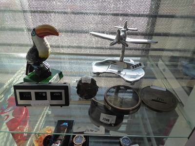 Lot 2359 - Shelf containing a model toucan, a model plane,...