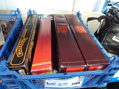 Lot 2484 - Tray containing four boxed model trains from...