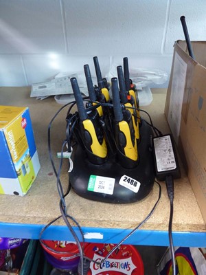 Lot 2488 - 6 motorola walkie talkies in a docking station