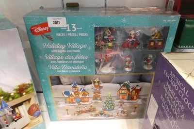 Lot 2011 - Disney 13 piece animated Christmas village...