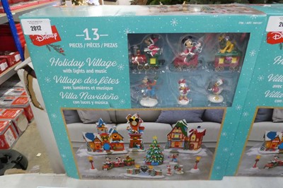 Lot 2012 - Disney 13 piece animated Christmas village...