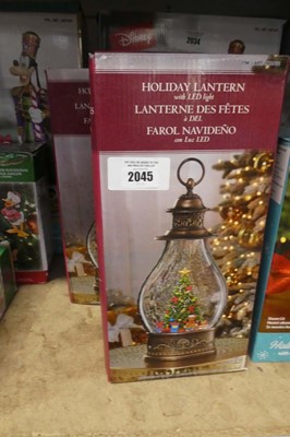 Lot 2045 - Pair of battery operated Christmas snow globe...