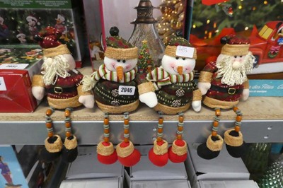 Lot 2046 - 2 pairs of Santa and snowman bookshelf sitting...