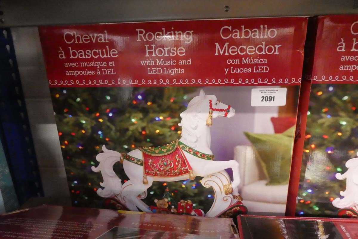 Lot 2091 - Christmas themed rocking horse with integrated...