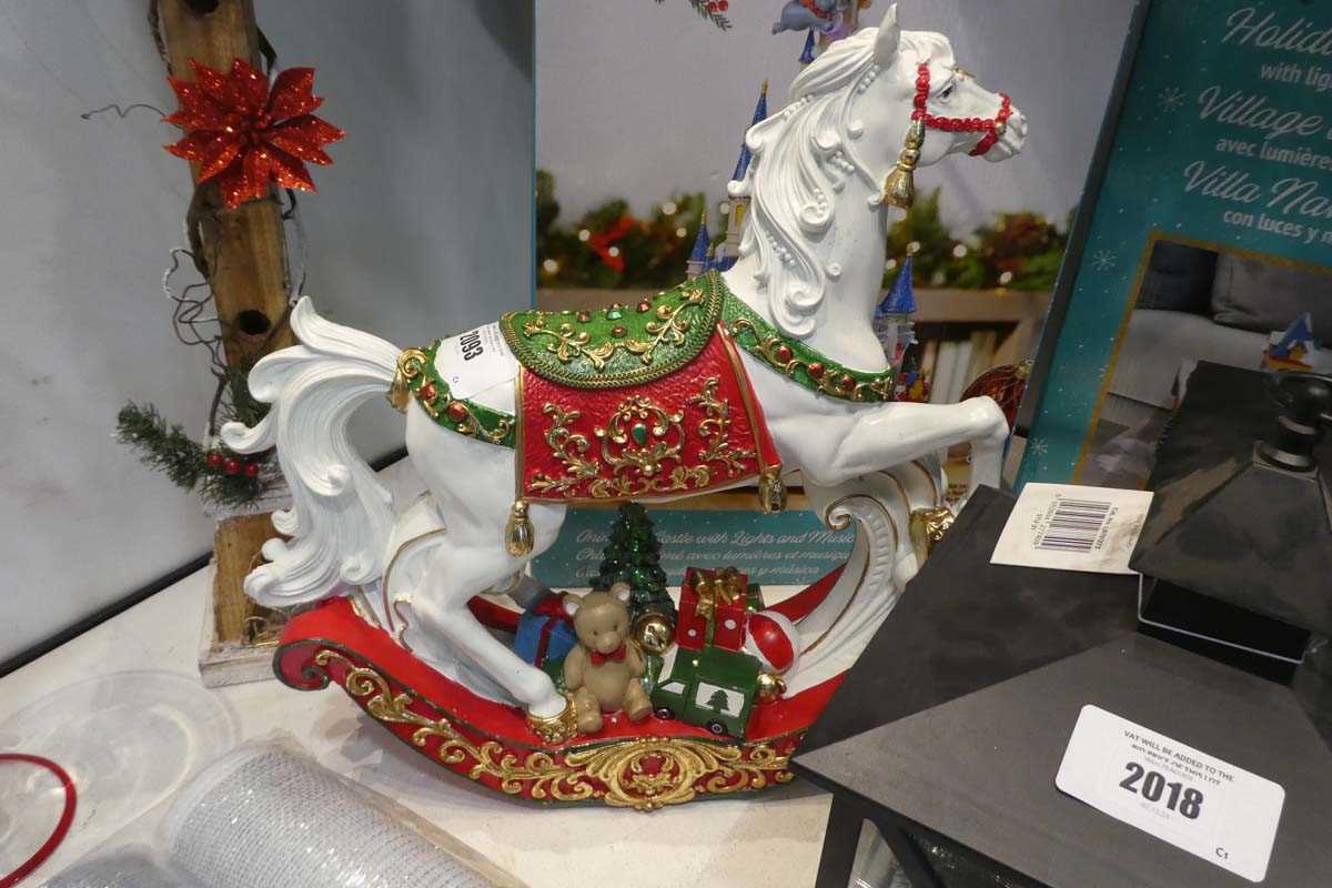 Lot 2093 - Christmas themed rocking horse with integrated...