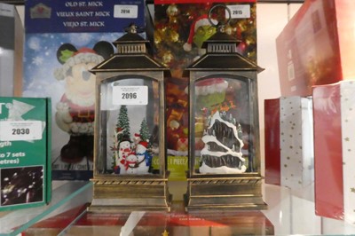 Lot 2096 - Pair of battery operated Christmas themed snow...