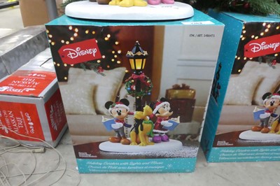 Lot 2163 - Disney holiday carollers with integrated...