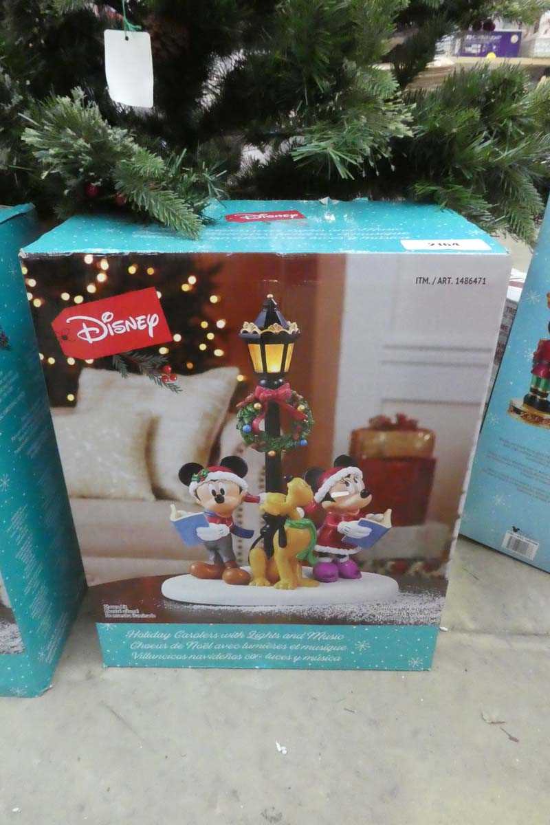 Lot 2164 - Disney holiday carollers with integrated...