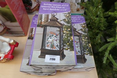 Lot 2190 - 3 battery operated Christmas themed snow globe...