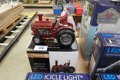 Lot 2218 - 23cm pre lit Santa driving tractor together...