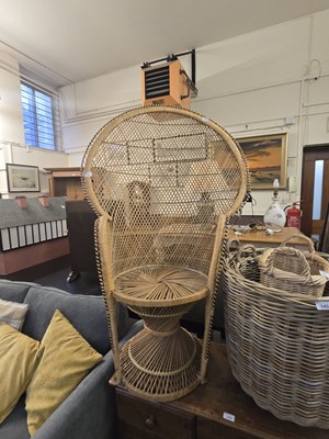 Lot 136 - A wicker peacock chair