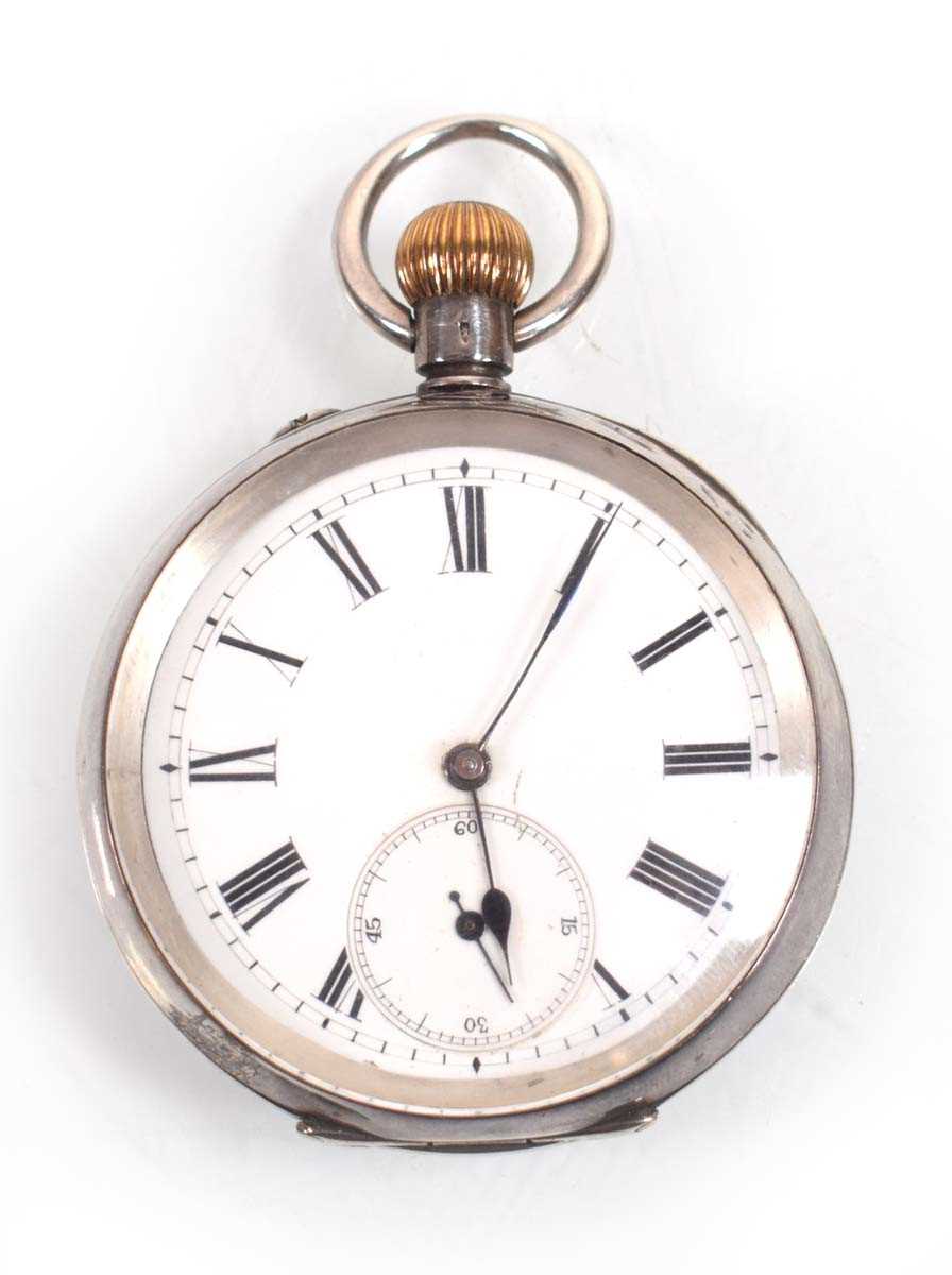 Lot 456 - A silver open face pocket watch, the white...