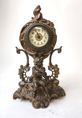 Lot 308 - A late 19th century brass mantle timepiece,...