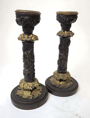 Lot 310 - A pair of brass finished and gilded...