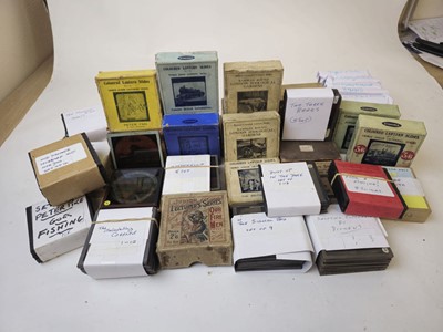 Lot 321 - A group of glass magic lantern slides, many...