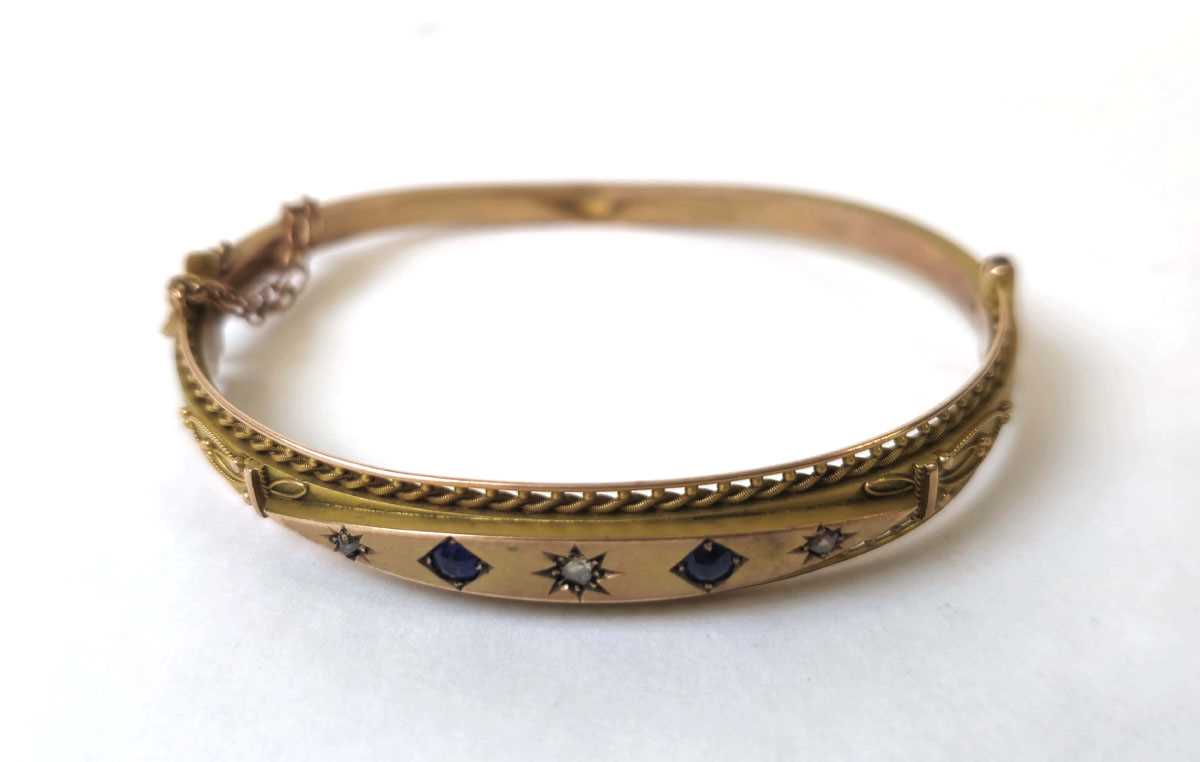 Lot 557 - An early 20th century 9ct gold, diamond and...