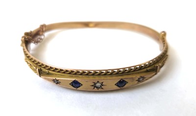 Lot 557 - An early 20th century 9ct gold, diamond and...