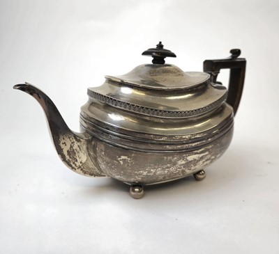 Lot 401 - A George III silver teapot of conventional...