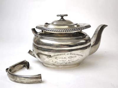 Lot 403 - A Victorian silver presentation teapot....