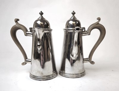 Lot 404 - A George V silver chocolate pot and coffee pot...