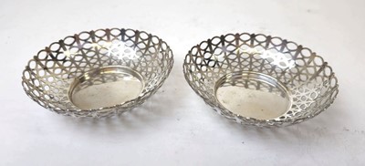 Lot 411 - A pair of Edwardian silver trinket dishes of...