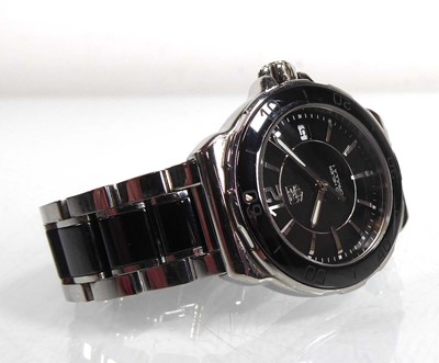 Lot 448 - A ladies stainless steel and black enamel...