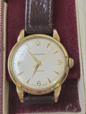 Lot 596 - A gentleman's 9ct gold Garrard automatic...