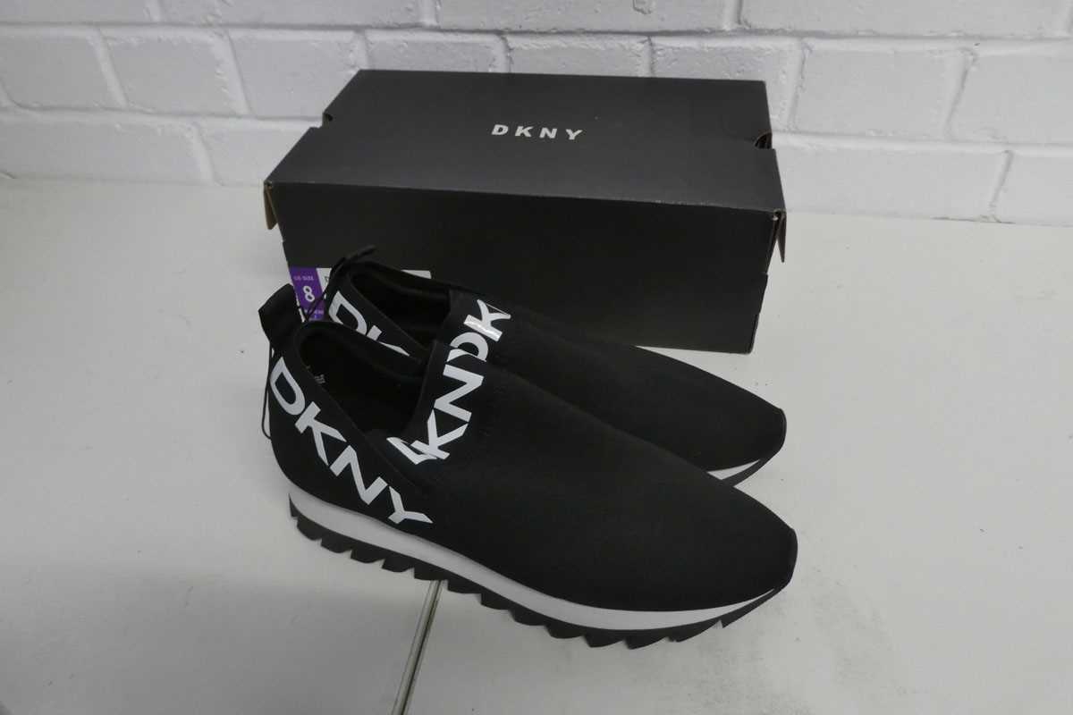 Lot 1346 - Boxed pair of ladies DKNY slip on trainers in...