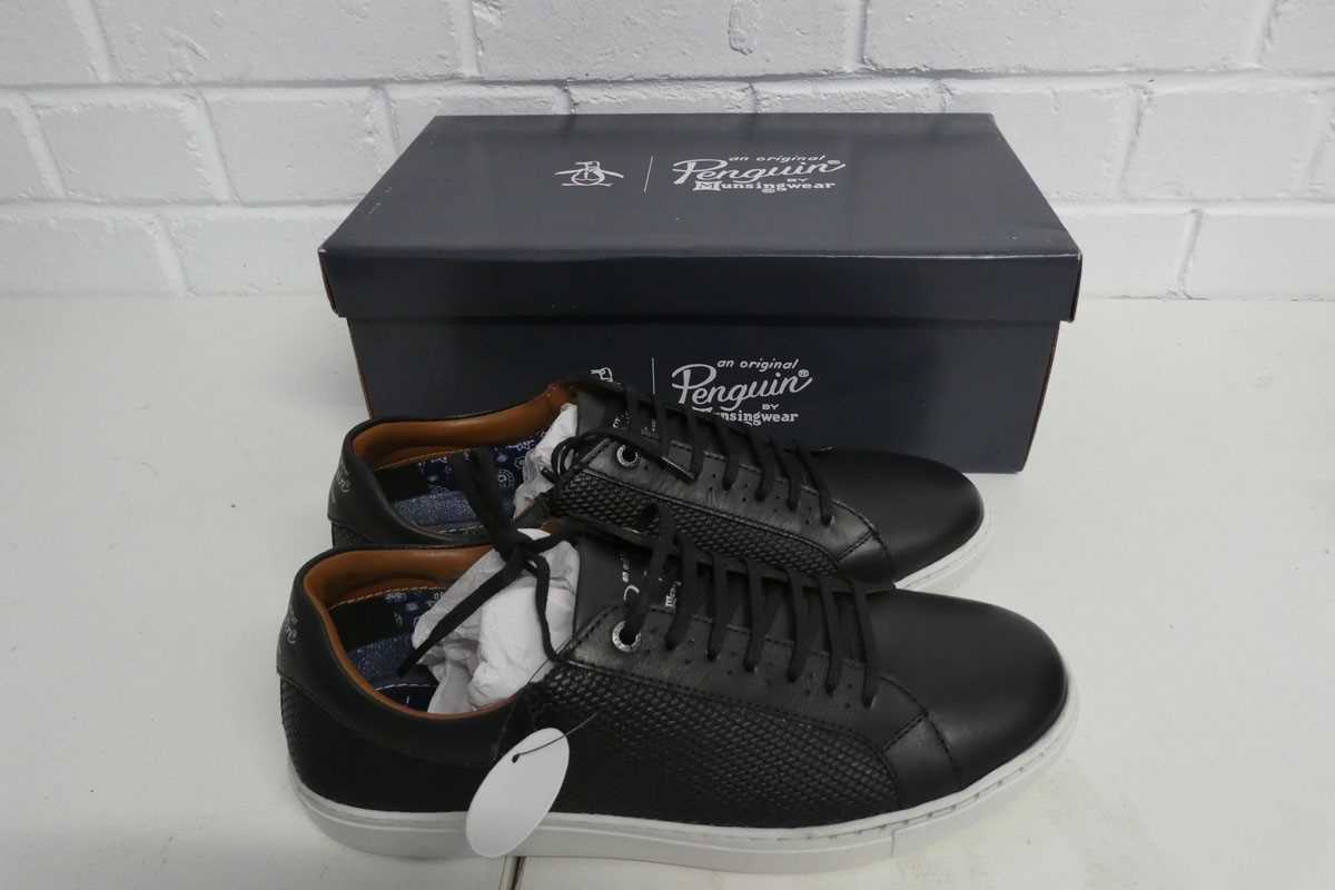 Lot 1353 - Boxed pair of mens Penguin paxton trainers in...