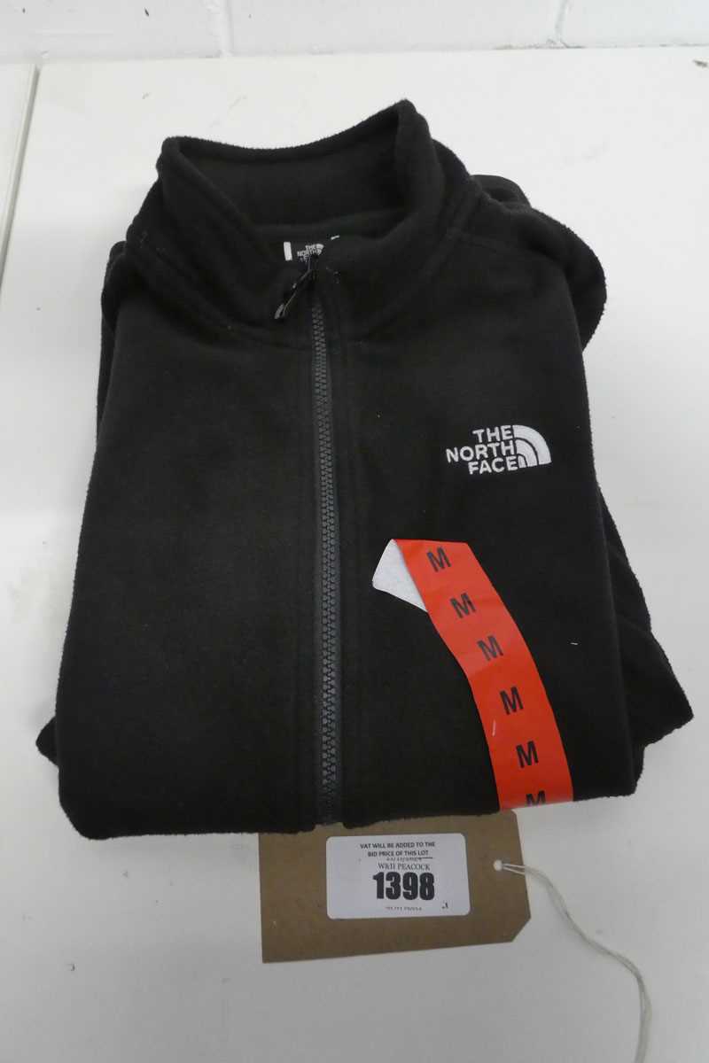 Lot 1398 - Ladies The North Face full zip fleece in black...