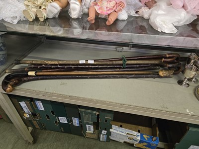 Lot 311 - An assortment of walking sticks to include...