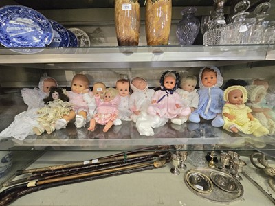 Lot 310 - An assortment of eleven baby dolls with...