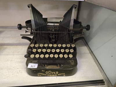 Lot 317 - An early 20th century metalwork typewriter...