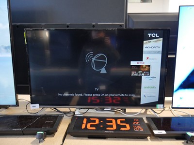 Lot 1006 - TCL 43" TV with stand and remote, model 43EP658