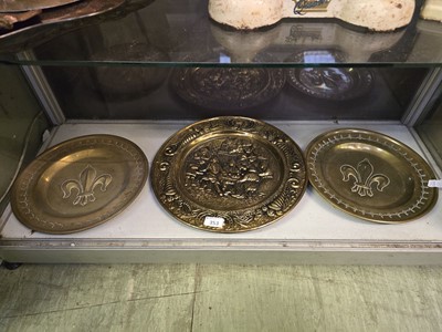 Lot 353 - Two embossed brass plates with fleur de lis...