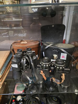 Lot 363 - Three cased sets of binoculars consisting of...