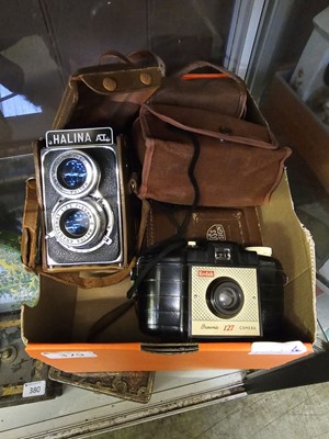 Lot 379 - A box containing an assortment of old cameras...