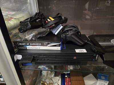 Lot 385 - A Sony Playstation 2 with controller and...