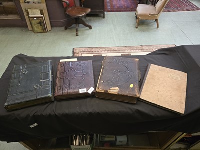 Lot 396 - Three leather bound Victorian photograph...