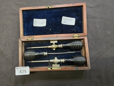 Lot 425 - A Victorian cased champagne tap set