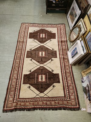 Lot 5 - An Iranian style wool rug with geometrical...