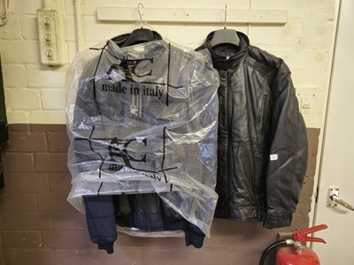 Lot 10 - One black leather jacket together with one...