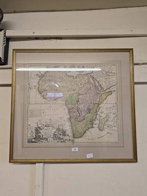 Lot 26 - A framed and glazed coloured map of Africa