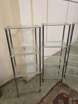 Lot 27 - Two chrome metal and plate glass four tier...