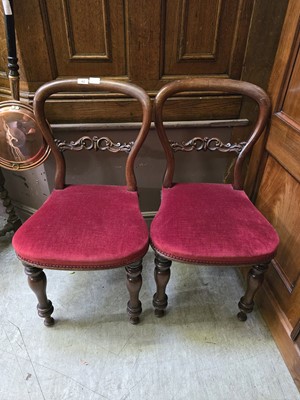 Lot 42 - A pair of rosewood balloon back dining chairs