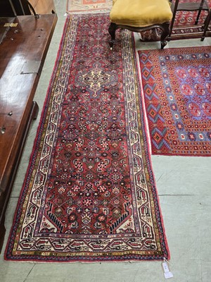 Lot 44 - A red ground Iranian runner