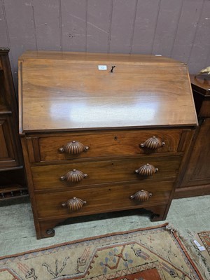 Lot 52 - An early 20th century walnut fall front bureau...