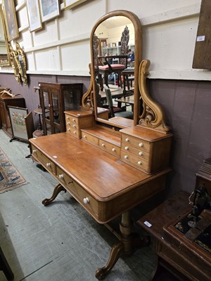 Lot 63 - A Victorian Duchess dressing table on turned...