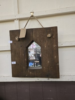 Lot 64 - A modern reclaimed wooden framed wall mirror